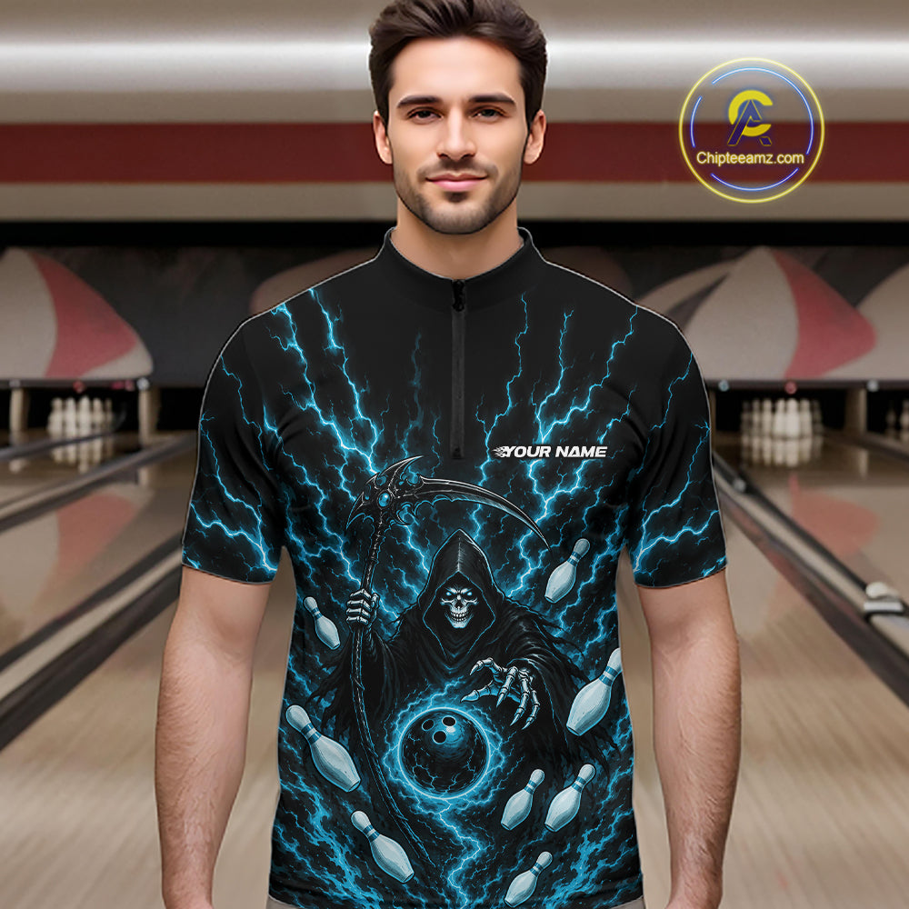 A man wearing a black short-sleeve zip-up jersey with a blue lightning and grim reaper design, standing in front of a blurred bowling alley background. 