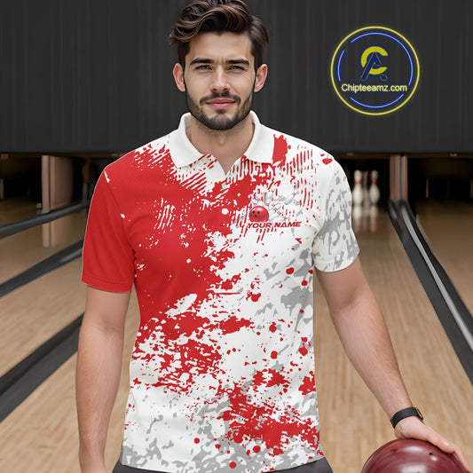 Front view of a male model in a bowling lane wearing a red and white splatter polo shirt with dynamic sporty bowling graphics.