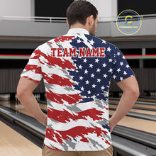 Load image into Gallery viewer, Man wearing a shirt with an American flag design and 'TEAM NAME' text in a bowling alley.
