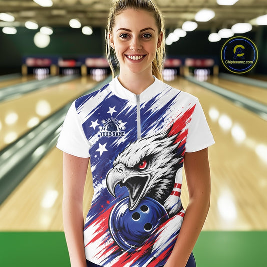 Woman wearing a custom bowling shirt with an eagle design in a bowling alley.