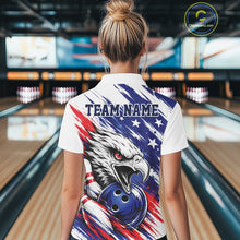 Load image into Gallery viewer, Women wearing a bowling shirt with an patritoic eagle design and 'TEAM NAME' text in a bowling alley.