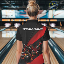 Load image into Gallery viewer, Back view female model inside bowling venue wearing black and red quarter zip shirt featuring flaming bowling ball hitting pins design