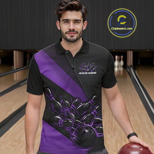 Load image into Gallery viewer, Male model seen from the front in a bowling lane wearing a black and purple polo shirt featuring a flame bowling ball striking pins in a dynamic sports action scene.