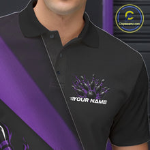 Load image into Gallery viewer, Close-up view of the left chest area of a black and purple bowling polo shirt showing a flame bowling ball and pins design detail.