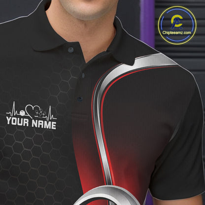Close-up of the left chest area of a black and red bowling polo shirt, featuring honeycomb design with a heart-shaped bowling ball hitting pins.