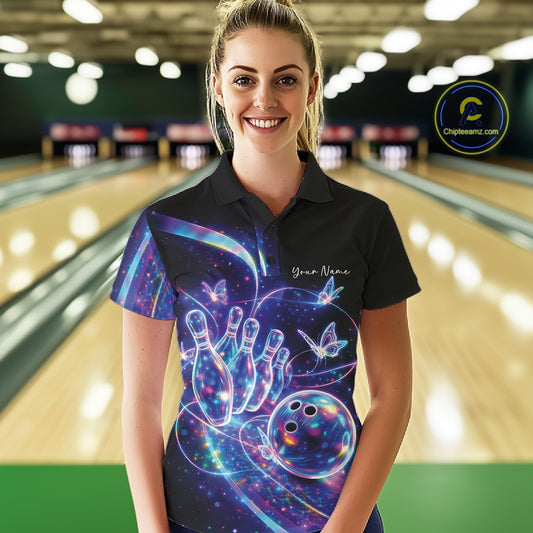 Front view of a female model in a black bowling polo featuring a starry galaxy background, neon swirls, and hologram butterfly graphics