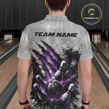 Load image into Gallery viewer, Back view of a male model wearing a gray bowling polo shirt with a dramatic purple bowling ball striking pins graphic accented by claw-mark artwork in a bowling lane.