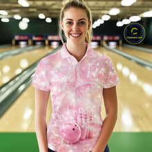 Load image into Gallery viewer, Female model at a bowling lane wearing a bowling polo shirt with glitter butterfly artwork, diamond accents, bowling pins, and a bowling ball.