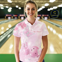 Load image into Gallery viewer, Female model wearing a bowling polo shirt at a bowling lane with pink glitter butterflies, roses, bowling pins, and bowling ball artwork.