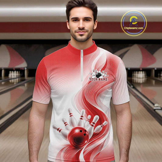 Front view of a male model wearing a white and red bowling quarter-zip shirt with elegant wave patterns and a bowling ball striking pins