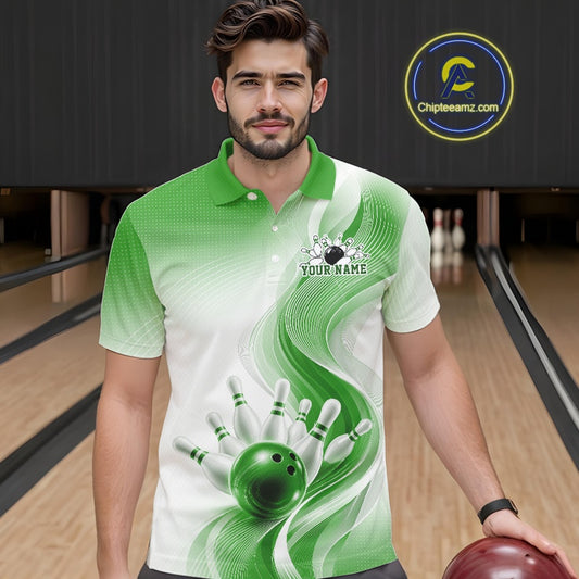 Male model inside a bowling center wearing a white and green bowling polo shirt with flowing wave artwork and a bowling ball knocking down pins