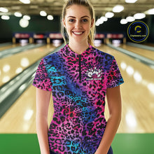 Load image into Gallery viewer, Smiling woman in a bowling alley wearing a purple, blue, and black leopard-print bowling quarter zip shirt with “Your Name” and a bowling pins graphic on the chest.