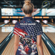 Load image into Gallery viewer, Back view of a female model wearing a bowling quarter zip shirt featuring a patriotic raccoon flashing a peace sign with a red, white, and blue bowling ball crashing through pins beneath a flowing American flag in a bowling lane.