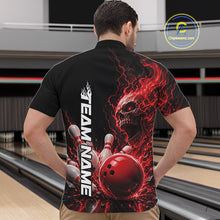 Load image into Gallery viewer, Front view of a male model in a bowling alley wearing a black quarter zip bowling shirt with a red flaming skull, lightning, bowling pins, and a custom name.
