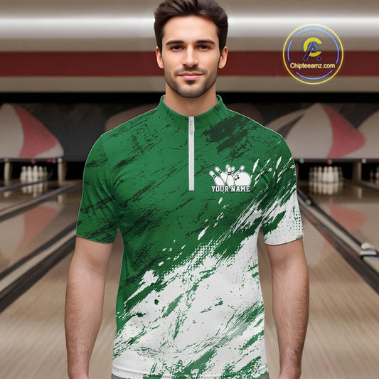 Man wearing a green and white sports jersey with a bowling alley in the background
