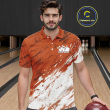 Load image into Gallery viewer, Front view of a male model in a bowling alley wearing a bowling polo shirt featuring a white paint splatter distressed sportswear design on an orange shirt.

