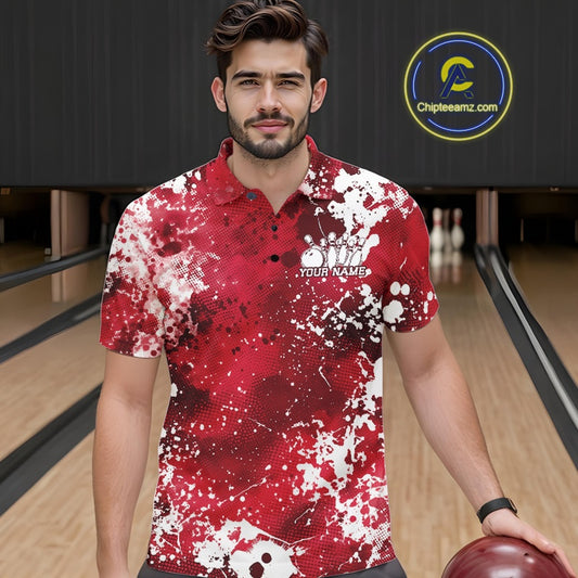 Man wearing a red and white patterned polo shirt with a bowling alley in the background
