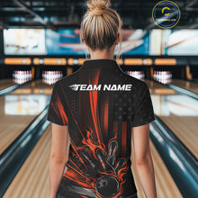 Load image into Gallery viewer, Back view of a female model in a bowling alley wearing a black and orange polo featuring patriotic bowling action artwork with distressed flag styling.