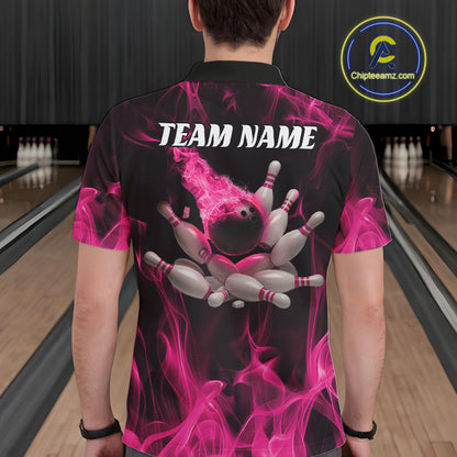 Back view of a male model in a bowling center wearing a black and pink polo showcasing bowling pins scattering with flame effects.