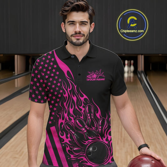 Male model wearing a black bowling polo shirt at a bowling lane with pink flame bowling strike graphics and patriotic styling.