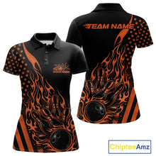 Load image into Gallery viewer, Front and back view of a black women’s bowling polo shirt featuring an orange flaming bowling ball striking pins with a patriotic American flag theme.