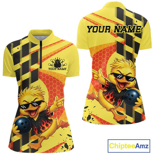 Front and back views of a women's short-sleeve polo shirt in bright yellow with black and orange graphic designs, featuring a cartoon bowling duck character, flame details, hazard stripes, and customizable text placeholders.