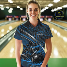 Load image into Gallery viewer, Female model in a bowling lane wearing a black and blue polo shirt with honeycomb texture and a dynamic flame bowling strike illustration.