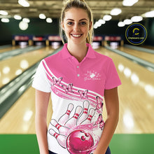 Load image into Gallery viewer, Front view of a female model in a white and pink bowling polo featuring butterfly graphics and colorful bowling artwork