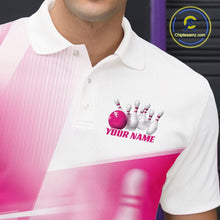 Load image into Gallery viewer, Close up left chest view of a white and pink bowling polo shirt with bowling ball and pins blended into a pink geometric pattern.