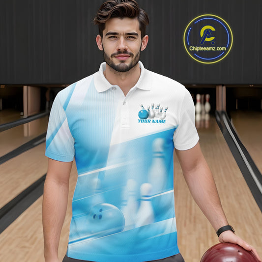 Front view of a male model at a bowling lane wearing a white and blue bowling polo shirt with bowling ball and pins geometric artwork.