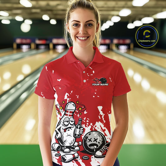 Female model at a bowling lane wearing a red and white polo shirt, humorous drunk bowling pin artwork with beer bottle and bowling ball.
