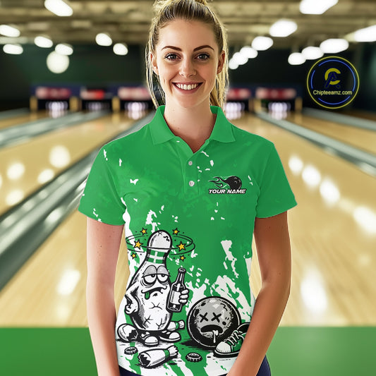 Female model at a bowling lane wearing a green and white polo shirt, humorous drunk bowling pin artwork with beer bottle and bowling ball over splatter background.