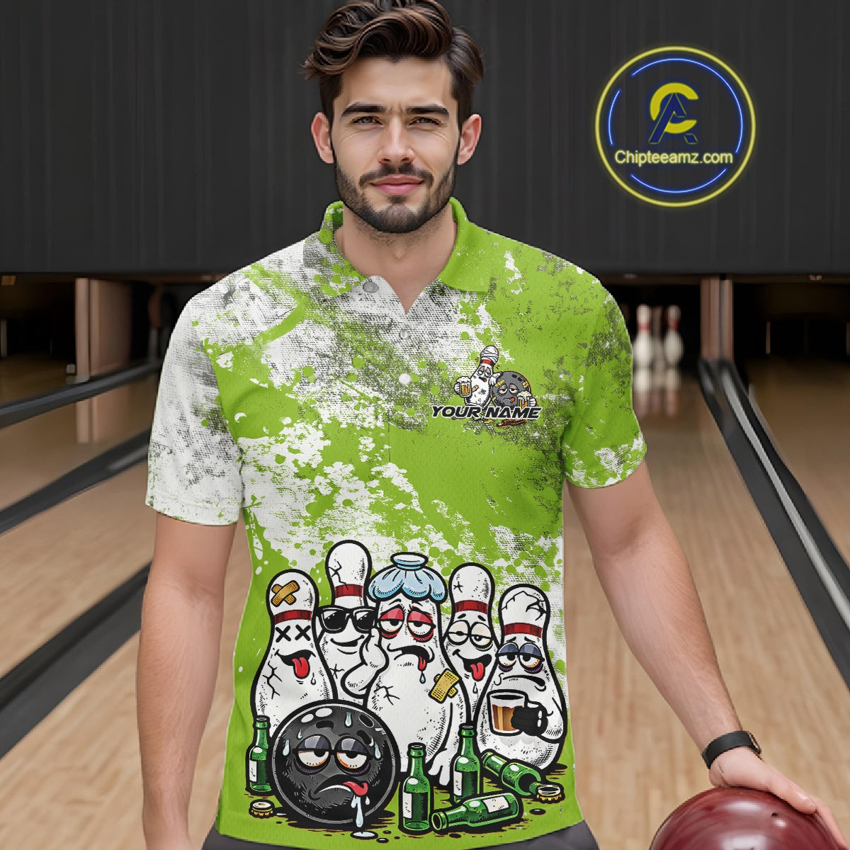 Front view of a male model in a bowling lane wearing a green and white grunge splatter polo shirt with humorous cartoon bowling pins and beer bottle scene.