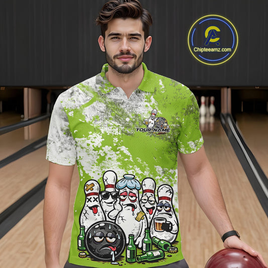 Front view of a male model in a bowling lane wearing a green and white grunge splatter polo shirt with humorous cartoon bowling pins and beer bottle scene.