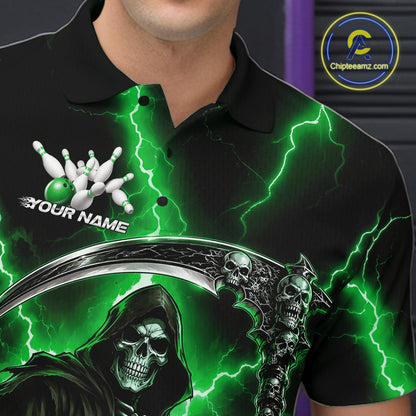 A close-up of a person wearing a black short-sleeve polo shirt with a vivid green lightning design, a grim reaper graphic, bowling pins, and the text 'YOUR NAME' on the chest. 