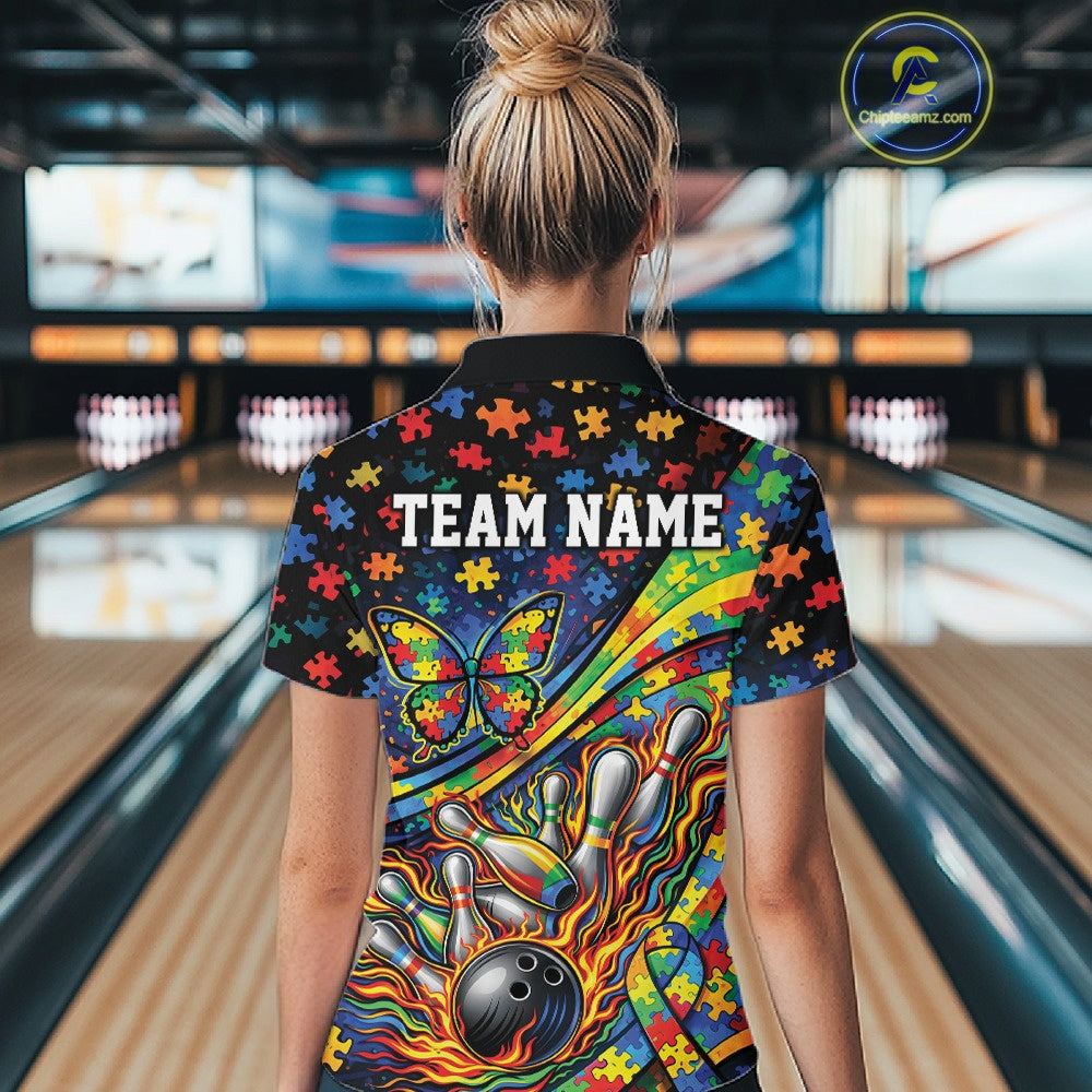 Female model inside a bowling center, back view of a colorful polo shirt featuring autism awareness ribbon and butterfly-inspired bowling graphics