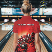 Load image into Gallery viewer, Female model at a bowling lane, back view of a red polo shirt featuring flame bowling ball and pins action scene design