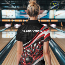 Load image into Gallery viewer, Back view of a female bowler wearing a black and red polo shirt, flame bowling strike design with dramatic pin impact scene.