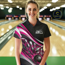 Load image into Gallery viewer, Female model at a bowling lane wearing a black and pink polo shirt, flaming bowling ball hitting pins with bold action-style design.
