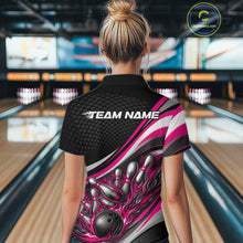 Load image into Gallery viewer, Back view of a female bowler wearing a black and pink polo shirt, flame bowling strike artwork with pins scattering effect.