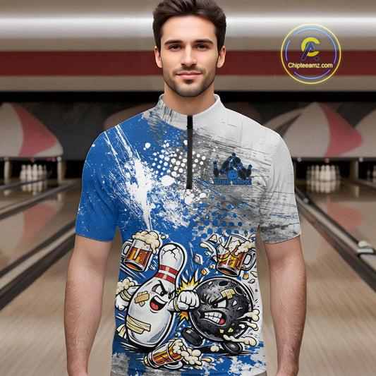 Front view of a male model in a bowling lane wearing a blue and white grunge splatter bowling quarter-zip shirt with funny cartoon bowling action graphics.