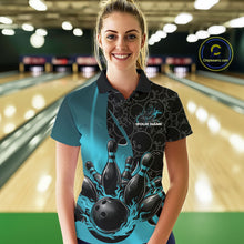 Load image into Gallery viewer, Front view of a female model in a bowling lane wearing a black and blue polo shirt with flaming black bowling ball striking pins and energetic bowling action graphics.