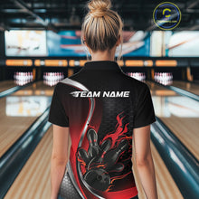Load image into Gallery viewer, Female model back view in bowling center wearing black and red polo shirt showcasing flame bowling ball striking pins in bold dynamic artwork.
