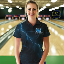 Load image into Gallery viewer, Female model wearing a black and blue bowling polo at the bowling lane with dragon claw artwork and fiery bowling graphics.