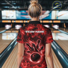 Load image into Gallery viewer, Back view of a red womens bowling polo displaying a bowling ball encircled by flames.