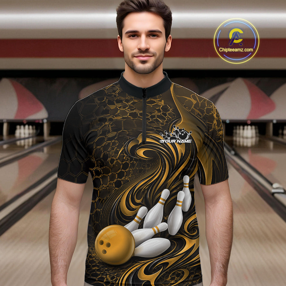 Male model wearing a black and yellow bowling quarter-zip shirt in a bowling alley featuring a tribal flame bowling ball and pins graphic