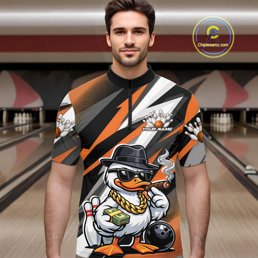 Male model in bowling lane wearing quarter-zip shirt with patriotic duck bowling ball graphic