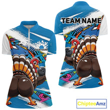 Load image into Gallery viewer, Front and back views of a blue custom women's quarter zip bowling shirt featuring a funny graffiti turkey holding a bowling ball, paint splatter accents, and a personalized name.