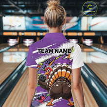 Load image into Gallery viewer, Back view of a female model in a bowling alley wearing a purple custom quarter zip bowling shirt with a funny graffiti turkey holding a bowling ball, paint splatter accents, and a personalized name.
