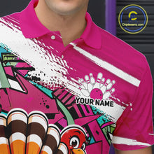 Load image into Gallery viewer, Close up front view of the left chest area on a pink custom bowling polo shirt, featuring a graffiti inspired urban street style design with paint splatter accents and a personalized name.
